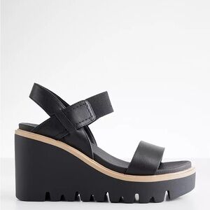 Mia brand black and tan wedge sandals. Brand new. Too big for me!